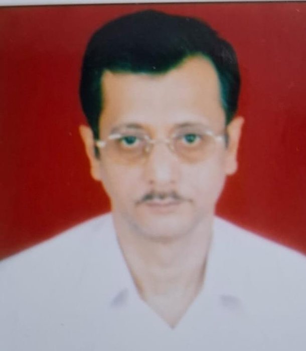 Dr T K Mukherjee